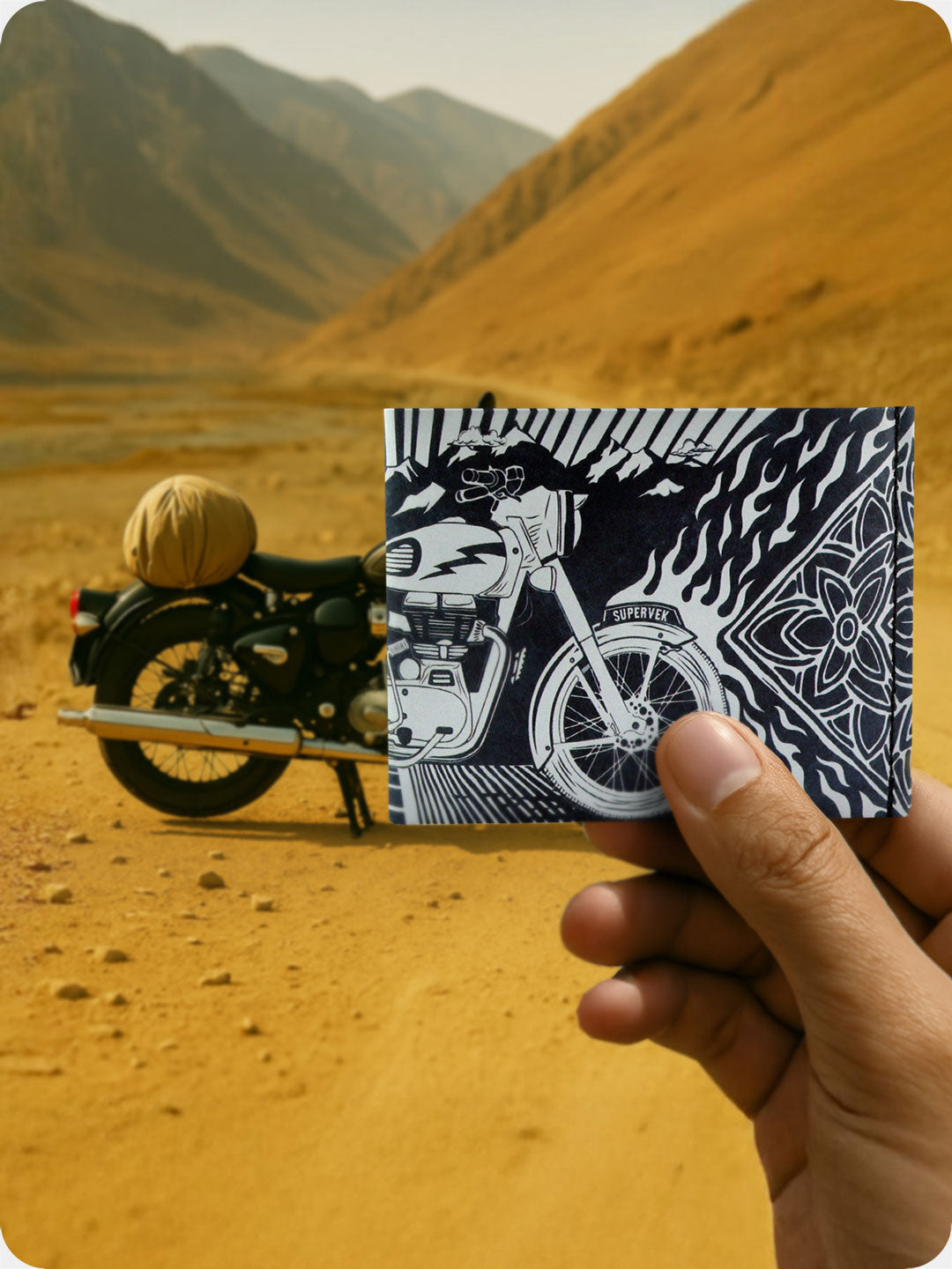 Supervek Tyvek wallet with "Royal Blaze" design, black slim vegan billfold held outdoors against mountain backdrop