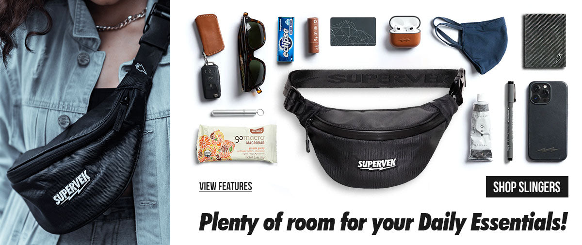 Person wearing a Supervek Carbon black water-resistant sling bag across the chest for urban commuting and travel - desktop.