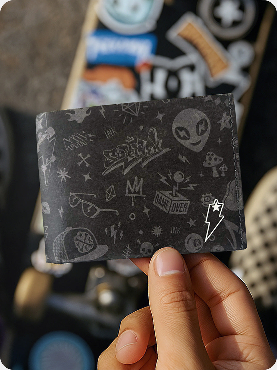 Supervek Tyvek wallet with "OG Culture" design, black ultra-slim vegan billfold held in hand, RFID-protected