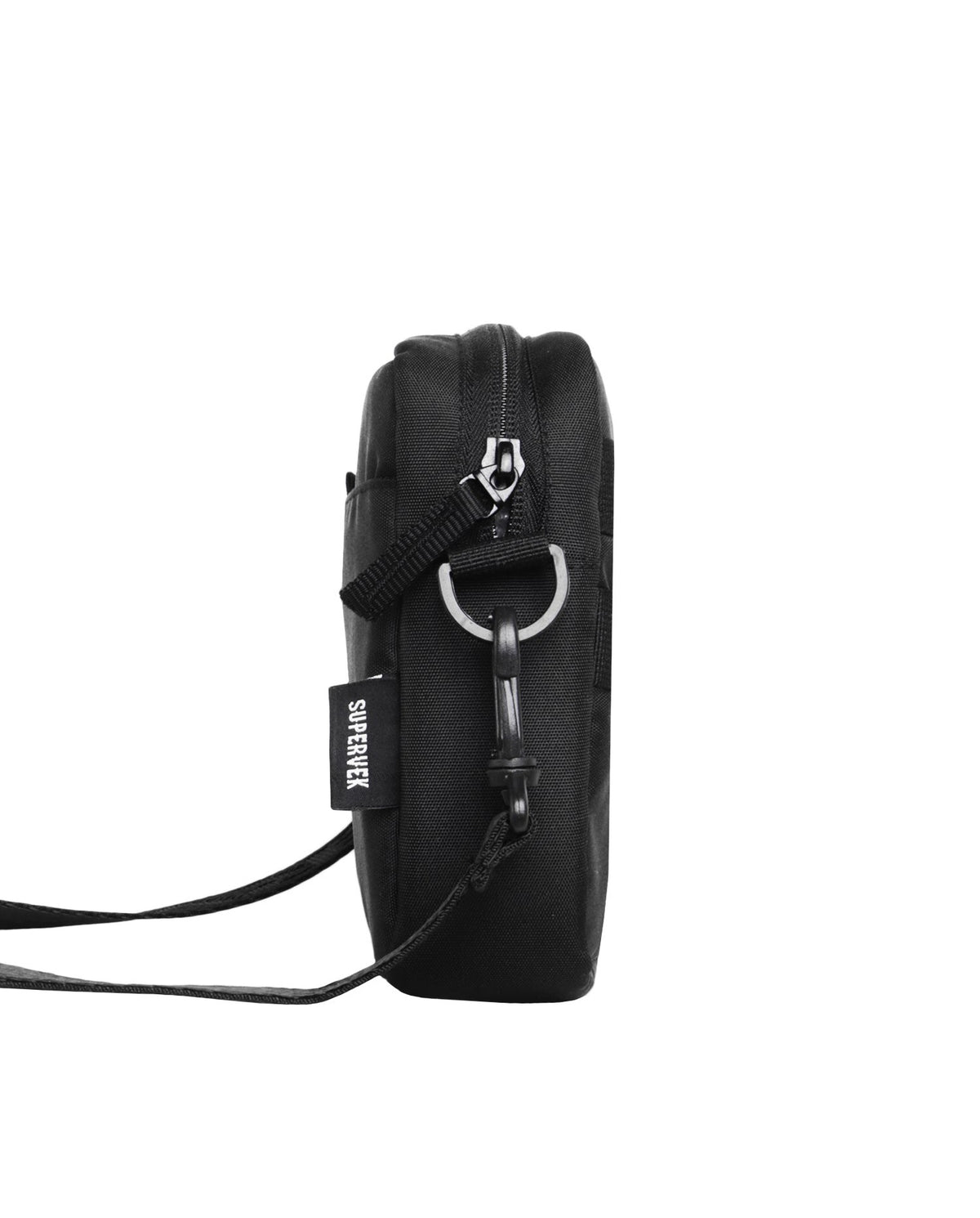 Side profile of the black Messenger Sling Bag showing its slim depth, top zipper and shoulder strap attachment ring.